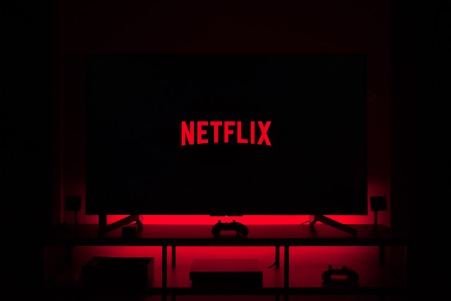 The cost of watching TV. Netflix logo.